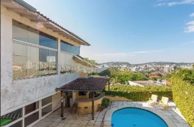 Casa com 5 quartos à venda na Rua Coroados, 536, Vila Assunção, Porto Alegre
