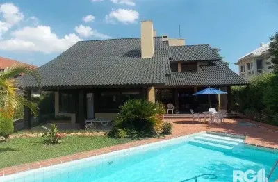 Casa em condomínio fechado com 4 quartos à venda na Avenida da Cavalhada, 5205, Cavalhada, Porto Alegre
