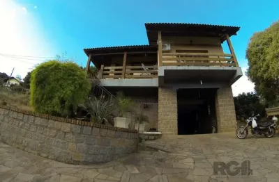 Casa com 3 quartos à venda na Rua Ida Passuello, 2486, Vila Nova, Porto Alegre