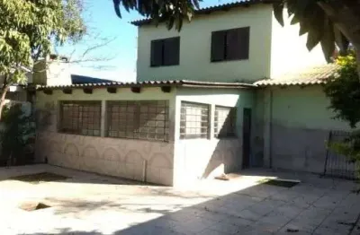 Casa com 3 quartos à venda na Rua Taimbé, 143, Sumaré, Alvorada