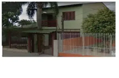 Casa com 3 quartos à venda na Rua Taimbé, 143, Sumaré, Alvorada
