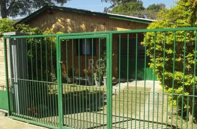Casa com 3 quartos à venda na Rua Paulo Rubilar de Farias, 65, Restinga, Porto Alegre