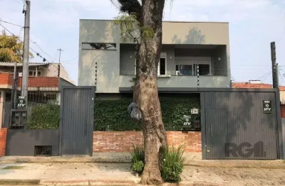 Casa com 4 quartos à venda na Rua Menezes Paredes, 290, Nonoai, Porto Alegre