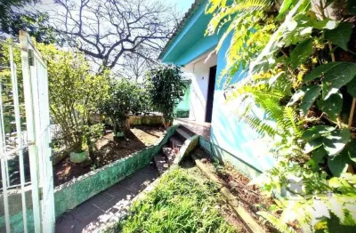 Casa com 4 quartos à venda na Rua Sebastião Wolf, 314, Nonoai, Porto Alegre