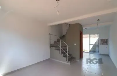 Casa condominio em porto alegre, no bairro vila nova, com 2 dormitório(s), e 2 banheiros, à venda.