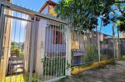 Casa com 4 quartos à venda na Rua Oscar Tollens, 63, Santa Tereza, Porto Alegre