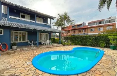 Casa de esquina com 285m², 3 dormitórios, sendo 1 suites, 4 vagas - amplo pátio com piscina, residencial bahamas