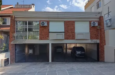 Apartamento térreo com 3 dormitórios e 2 vagas no bairro cristo redentor