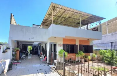 Casa com 5 quartos à venda na Avenida Vicente Monteggia, 2231, Cavalhada, Porto Alegre