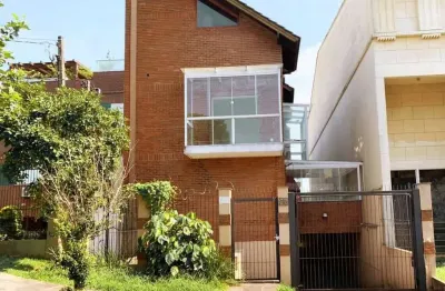 Casa em condomínio fechado com 3 quartos à venda na Rua São Leopoldo, 67, Vila Jardim, Porto Alegre