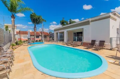 Casa 2 dormitorio em condominio com piscina costa gama