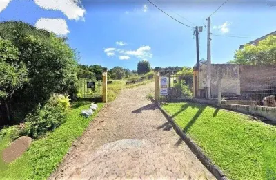 Terreno à venda na Rua Flor de Pessegueiro, 157, Vila Nova, Porto Alegre