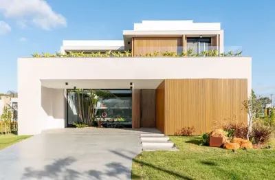 Linda casa para comprar com 4 suites em condomínio top