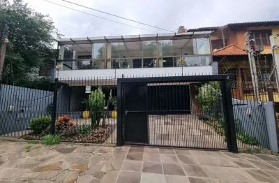 Casa com 3 quartos à venda na Rua Canto e Melo, 34, Nonoai, Porto Alegre