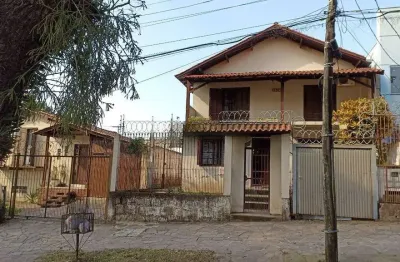 Casa com 3 quartos à venda na Avenida Doutor Petrônio Portella, 1415, Parque Santa Fé, Porto Alegre