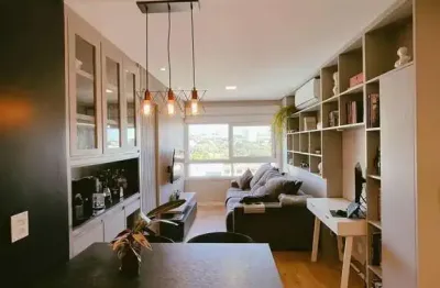 Apartamento com 1 dormitório e 1 vaga de garagem no Bairro Partenon