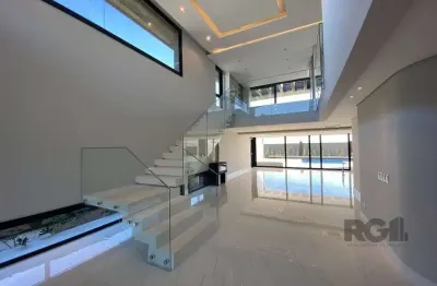 Casa para comprar no condomínio ponta da figueira - marina com 4 suítes