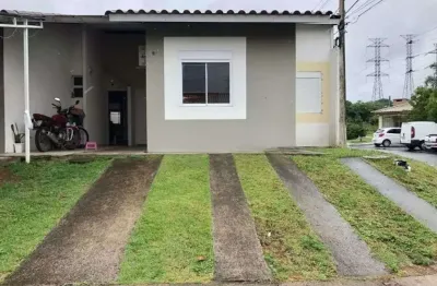 Casa em condomínio com 2 dormitórios, suíte e 2 vagas, infraestrutura completa.