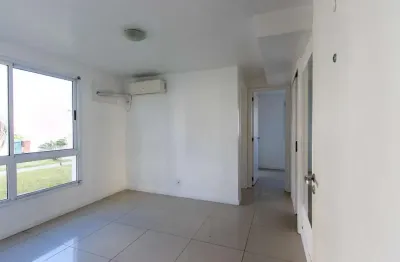 Apartamento térreo desocupado com 2 dormitórios i bairro hipica