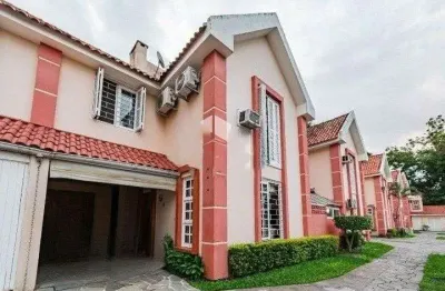 Casa em condomínio fechado com 3 quartos à venda na Rua Tamandaré, 1156, Camaquã, Porto Alegre