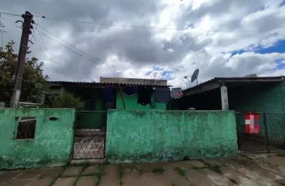 Casa com 3 quartos à venda na Acesso Quatro, 4958, Restinga, Porto Alegre