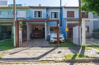 Casa com 3 quartos à venda na Rua Rodolpho Espinoza, 47, Hípica, Porto Alegre