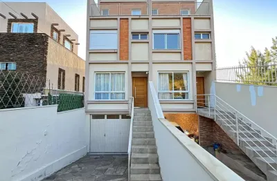 Casa com 3 quartos à venda na Rua Henrique Anawate, 650, Guarujá, Porto Alegre