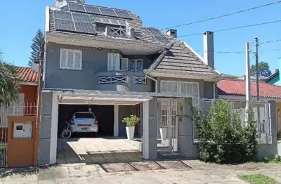 Casa com 4 quartos à venda na Rua Engenheiro Renato Costa Leite, 165, Ipanema, Porto Alegre