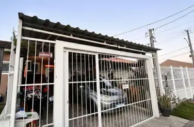 Casa com 2 quartos à venda na Rua Coronel Dastro Dutra, 277, Restinga, Porto Alegre