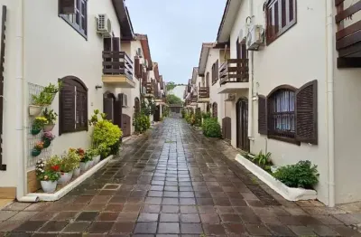 Casa em condominio horizontal com 3 dormitórios sendo 1 suíte com 1 vaga coberta