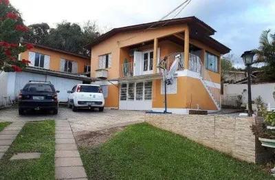 Casa com 4 quartos à venda na Rua José Alves de Castro, 468, Vila Nova, Porto Alegre