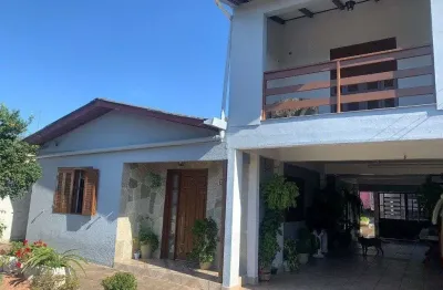 Casa com 4 quartos à venda na Rua Osvaldo Cruz, 159, Maringá, Alvorada