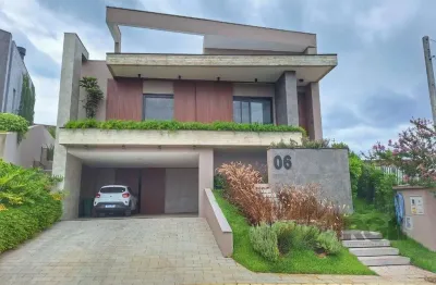 Casa mobiliada com 3 suítes no condomínio alphaville gravataí