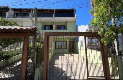 Casa com 2 quartos à venda na Rua Heitor Kramer, 490, Guarujá, Porto Alegre