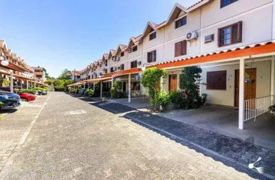 Casa em condomínio fechado com 94m2, 3 dormitórios no bairro camaquã.