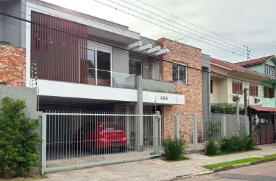 Casa contemporânea, 4 d, sendo 2 suítes, uma no térreo,206 m² , bairro tristeza