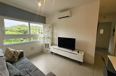 Apartamento mobiliado, 2 dormitórios, com vaga escriturada - cidade baixa