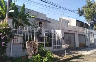 Casa com 5 quartos à venda na Rua Panambi, 280, Cavalhada, Porto Alegre