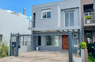 Casa com 3 quartos à venda na Rua Roberto Santini, 174, Hípica, Porto Alegre