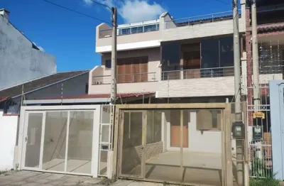 Casa com 3 quartos à venda na Rua Waldemar da Silva Tavares, 234, Guarujá, Porto Alegre