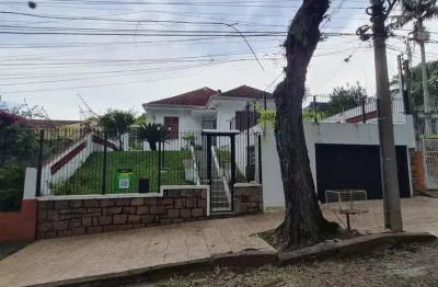 Casa com 3 quartos à venda na Rua Tobias Barreto, 408, Partenon, Porto Alegre