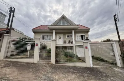 Casa de 2 pisos, 3 dormitórios e 2 vagas de garagem coberta em Canoas.
