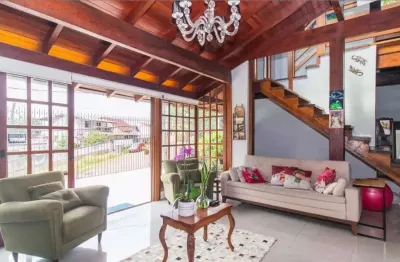 Casa com 3 quartos à venda na Avenida Deputado Aramy Silva, 106, Teresópolis, Porto Alegre