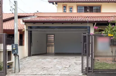 Casa com 4 quartos à venda na Rua Augusto Comte, 45, Cavalhada, Porto Alegre