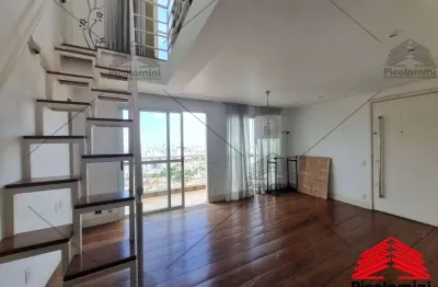 Apartamento de 118 m² na Mooca, 3 dormitórios (1 suíte), sala de estar/jantar, sala de TV no mezanino e 2 vagas cobertas fixas.