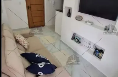 Apartamento a venda na praia grande de 43m², 1 quarto, 1 banheiro, varanda, cozinha planejada, ar condicionado, 1 vaga de garagem