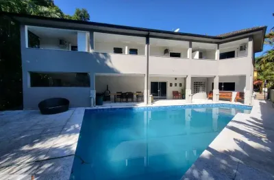 Luxuosa casa em condomínio à venda em bertioga-sp, guaratuba: 4 quartos, 4 suítes, 3 salas, 4 vagas e 450m²!