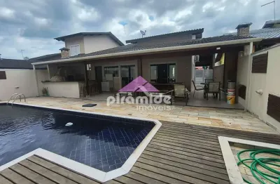 Casa com 4 dormitórios à venda, 220 m² por r$ 1.280.000,00 - massaguaçu - caraguatatuba/sp