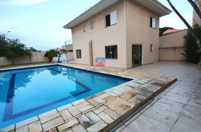 Casa com 4 quartos para alugar na Rua Zequinha de Abreu, 229, Balneário Flórida, Praia Grande