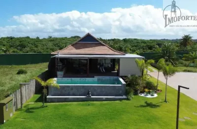 Linda casa térrea, com vista para o mar e 4 confortáveis suítes no imbassaí privilege !